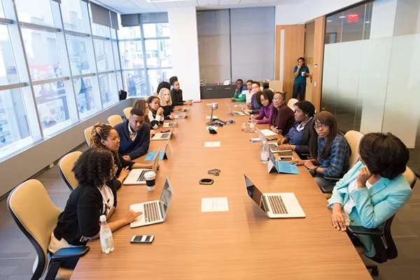 Business persons sitting together