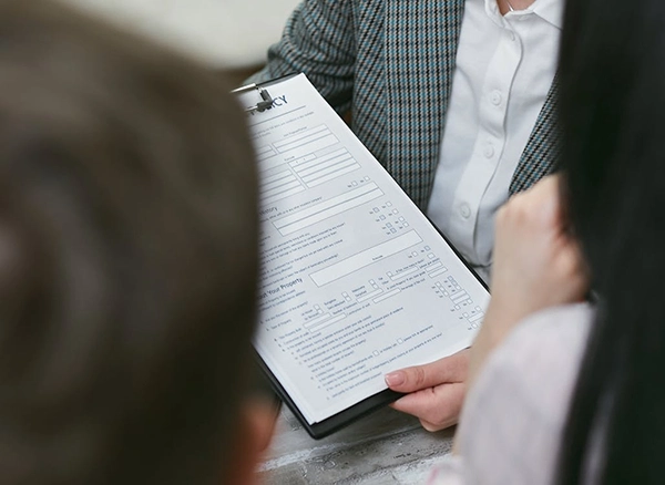 person-holding-a-contract-document